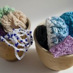Colorful crochet bracelets in bowls