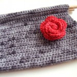 Devotee Clutch Free Crochet Pattern with floral detail