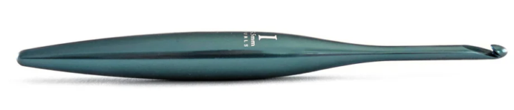 Venture & Tempest: A Furls Crochet Giveaway! This is a picture of one blue crochet hook laid on it's side. 